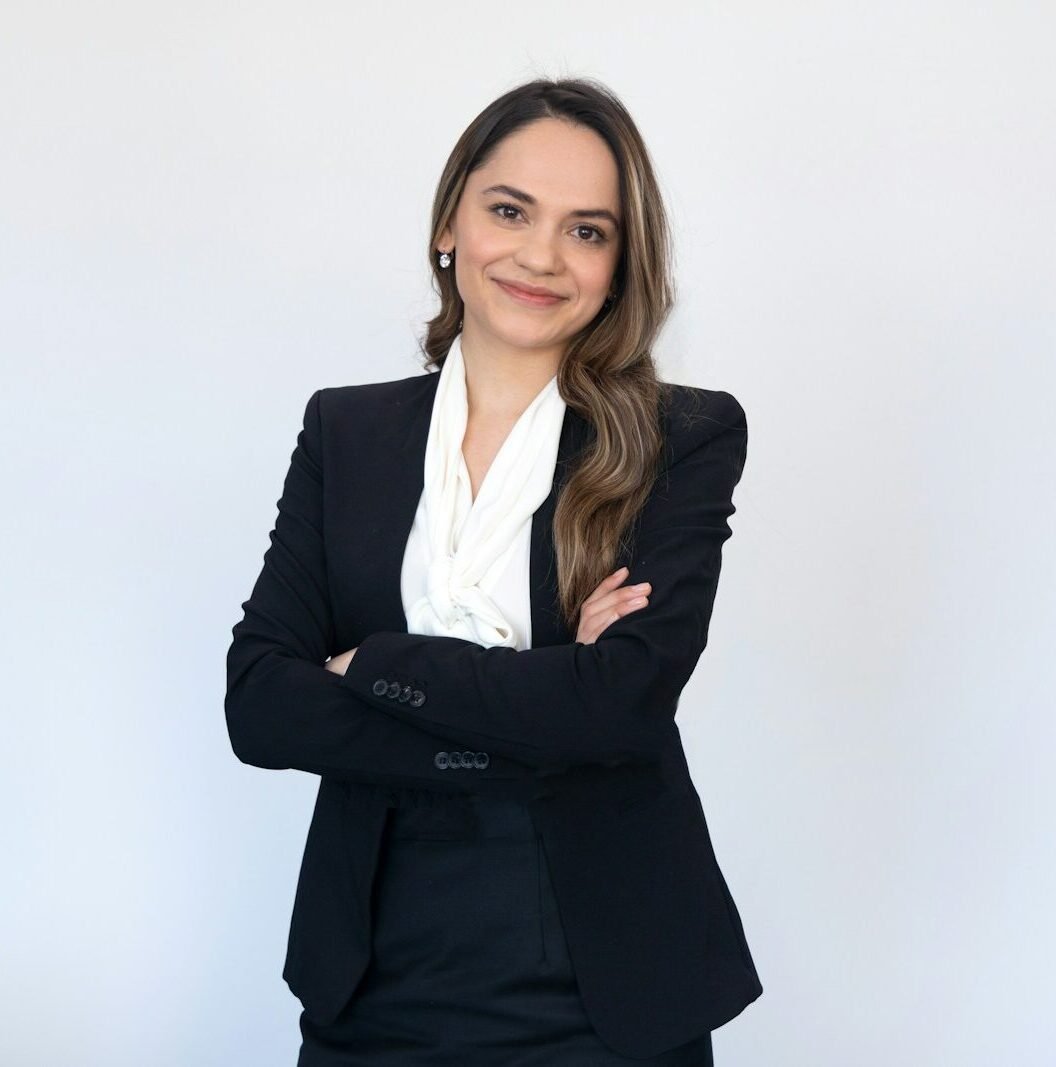 a woman in a black suit